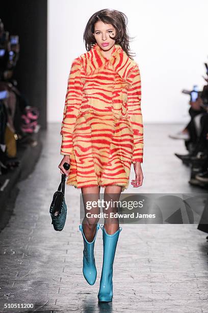 Model walks the runway during the Jeremy Scott fashion show at The Arc, Skylight at Moynihan Station on February 15, 2016 in New York City.