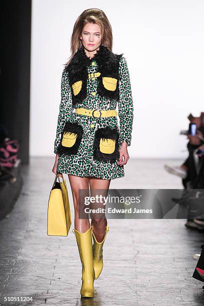 Karlie Kloss walks the runway during the Jeremy Scott fashion show at The Arc, Skylight at Moynihan Station on February 15, 2016 in New York City.