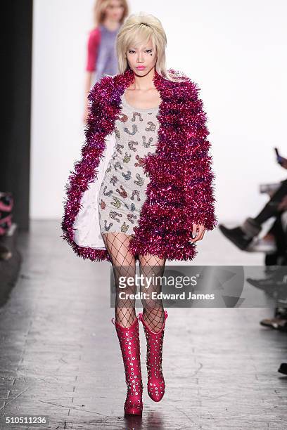 Model walks the runway during the Jeremy Scott fashion show at The Arc, Skylight at Moynihan Station on February 15, 2016 in New York City.