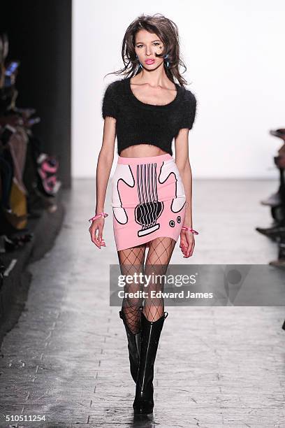 Model walks the runway during the Jeremy Scott fashion show at The Arc, Skylight at Moynihan Station on February 15, 2016 in New York City.