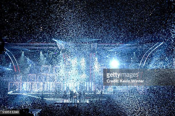 Confetti drops as recording artists Robin Thicke, Joe Perry, and Pitbull perform onstage during The 58th GRAMMY Awards at Staples Center on February...
