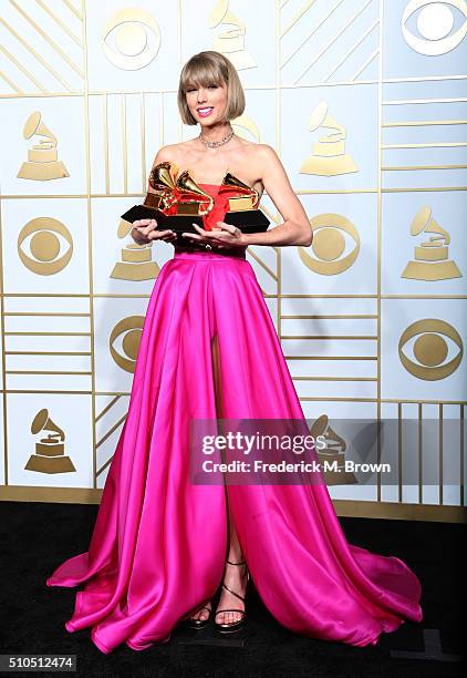 Singer Taylor Swift, winner of the awards for Album of the Year and Best Pop Album for "1989" and Best Music Video for "Bad Blood," poses in the...