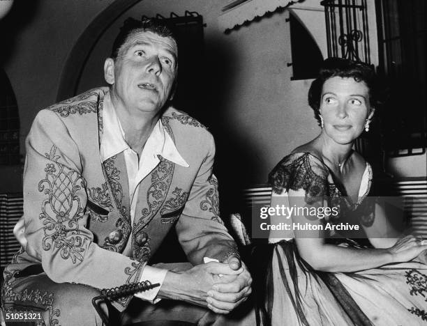 Future American president Ronald Reagan and his wife Nancy Reagan at a costume party given by Rory Calhoun, 1950s.