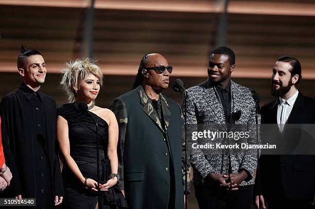 Recording artist Stevie Wonder and the Pentatonix present award for Song of the Year onstage during The 58th GRAMMY Awards at Staples Center on...