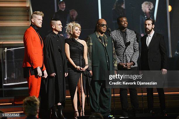 Recording artist Stevie Wonder and the Pentatonix present award for Song of the Year onstage during The 58th GRAMMY Awards at Staples Center on...