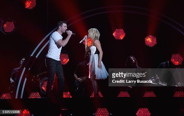 Singers Sam Hunt and Carrie Underwood perform onstage during The 58th GRAMMY Awards at Staples Center on February 15, 2016 in Los Angeles, California.