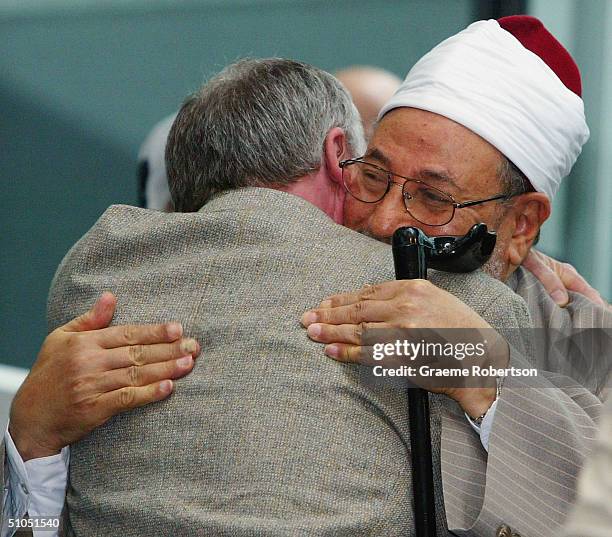 Controversial Muslim cleric Sheikh Yusuf Al-Qaradawi meets Ken Livingstone as he attends the "A woman's right to choose" conference on July 12, 2004...