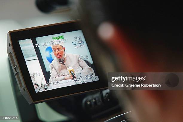 Controversial Muslim cleric Sheikh Yusuf Al-Qaradawi is pictured through a viewfinder as he attends the "A woman's right to choose" conference on...