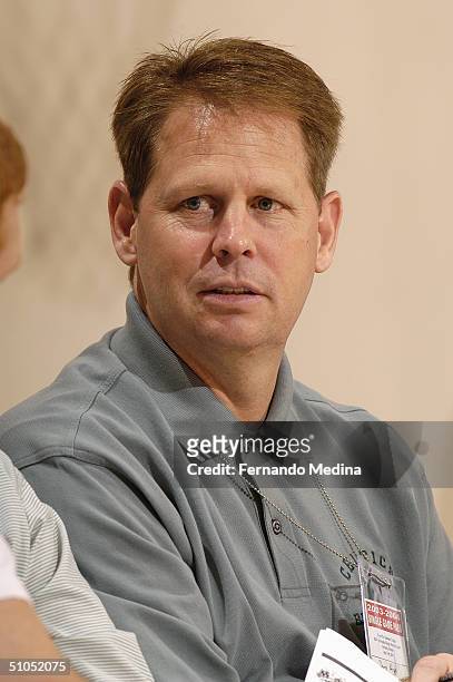 Executive Director of Basketball Operations Danny Ainge of the Boston Celtics looks on during the game against the New Jersey Nets at the 2004 Pepsi...