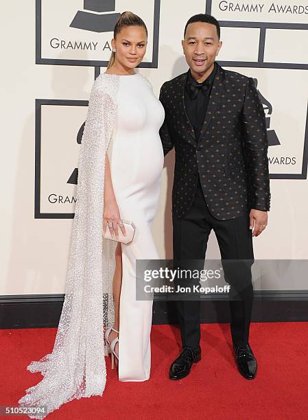 Model Chrissy Teigen and singer John Legend arrive at The 58th GRAMMY Awards at Staples Center on February 15, 2016 in Los Angeles, California.