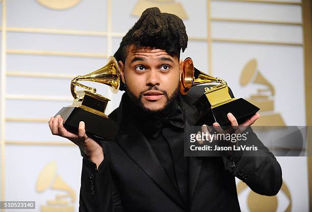 The Weeknd poses in the press room at the The 58th GRAMMY Awards at Staples Center on February 15, 2016 in Los Angeles, California.