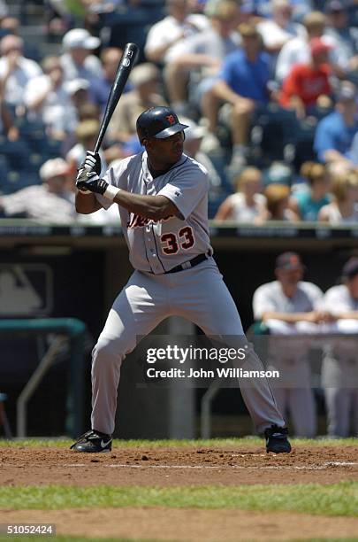 Outfielder Marcus Thames of the Detroit Tigers swings at a Kansas City Royals pitch during the MLB game at Kauffman Stadium on June 24, 2004 in...