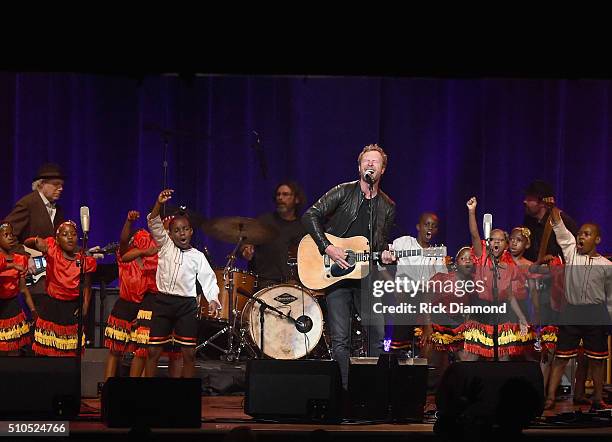 Singer/Songwriter Dierks Bentley performs with the African Children's Choir during "Nashville for Africa" to benefit the African Children's Choir at...