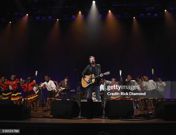 Singer/Songwriter Dierks Bentley performs with the African Children's Choir during "Nashville for Africa" to benefit the African Children's Choir at...