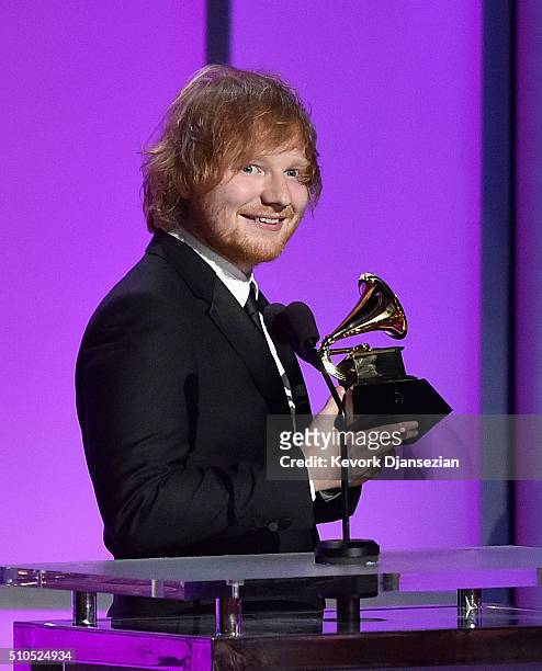 Singer-songwriter Ed Sheeran accepts the Grammy Award for Best Pop Solo Performance, for "Thinking Out Loud," onstage during the GRAMMY Pre-Telecast...