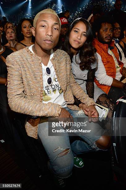 Singer Pharrell Williams and Helen Lasichanh attend The 58th GRAMMY Awards at Staples Center on February 15, 2016 in Los Angeles, California.