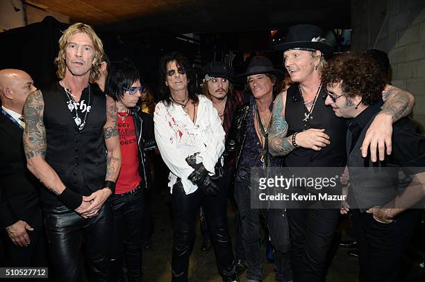 Musicians Duff McKagan, Tommy Henriksen, Alice Cooper, Johnny Depp, Joe Perry, Matt Sorum and Bruce Witkin attend The 58th GRAMMY Awards at Staples...