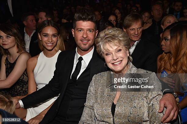 April Love Geary, artist Robin Thicke and Gloria Loring attend The 58th GRAMMY Awards at Staples Center on February 15, 2016 in Los Angeles,...