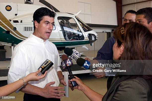 Mexican offical Geronimo Gutierez talks to the news media as 130 Mexican nationals who entered the U.S illegally were sent back on a special Mexicana...