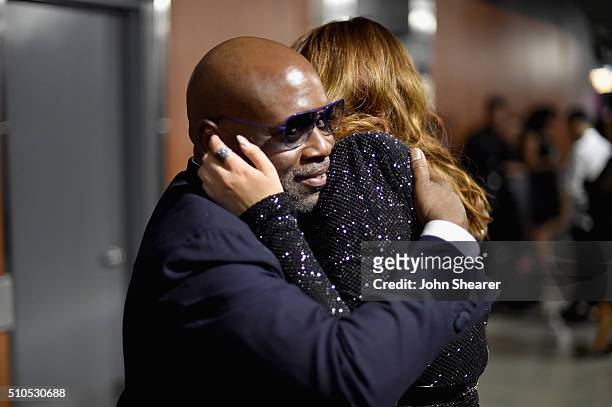 Producer L.A. Reid embraces singer Meghan Trainor during The 58th GRAMMY Awards at Staples Center on February 15, 2016 in Los Angeles, California.