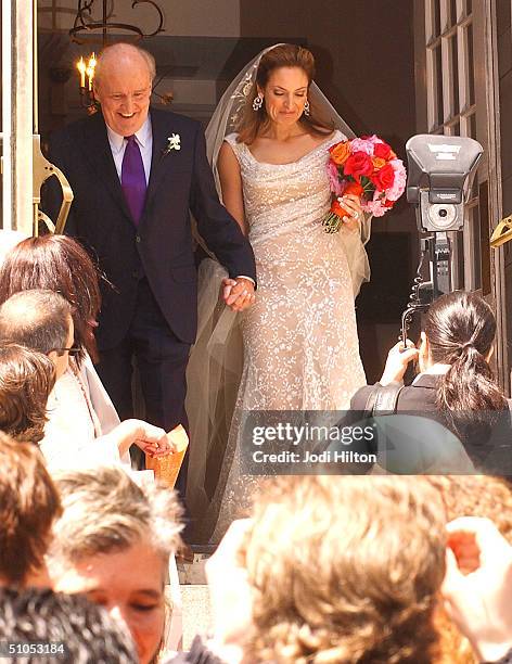 Jack Welch and his new wife Editor Suzy Wetlaufer photographed after their wedding at the Park Street Church in Boston, April 24, 2004.