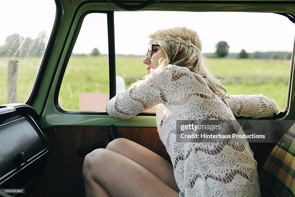 Hippie Woman Driving In Old Bus