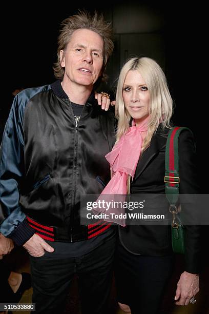 Musician John Taylor of Duran Duran and fashion designer Gela Nash attend Warner Music Groups' annual Grammy celebration at Milk Studios Los Angeles...