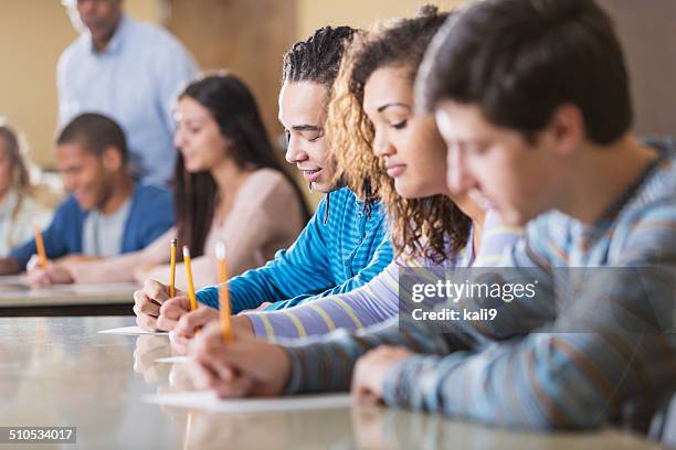 students taking exam - ssc exam stock pictures, royalty-free photos & images