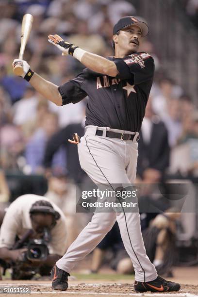 Rafael Palmeiro of the AmericanLeague team bats during the Major League Baseball Century 21 Home Run Derby at Minute Maid Park on July 12, 2004 in...