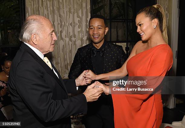 Chairman and CEO of Sony Music Entertainment Doug Morris, recording artist John Legend and model Chrissy Teigen attend Sony Music Entertainment 2016...
