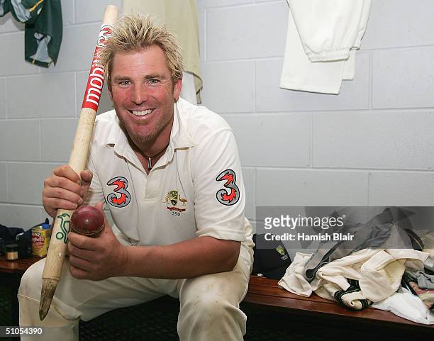 Shane Warne of Australia relaxes in the rooms after equalling Muttiah Muralitharan's World Record of 527 career wickets during day five of the Second...