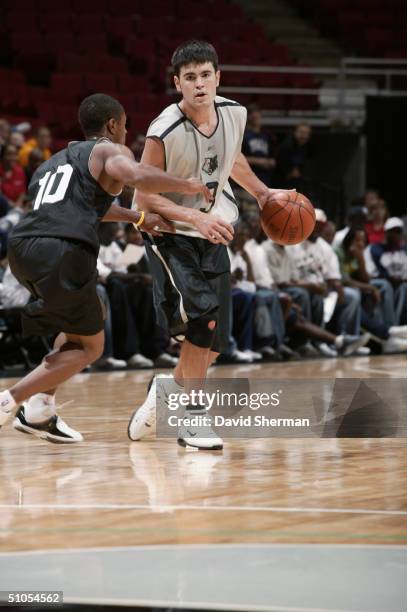 Blake Stepp of the Minnesota Timberwolves is defended by Patrick Jackson of the Charlotte Bobcats during the 2004 Summer League game at Target Center...
