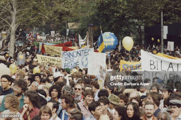 An anti-nuclear rally in Central Park, New York City, 12th June 1982. Among the banners is one by the 'Mennonites for Peace'.