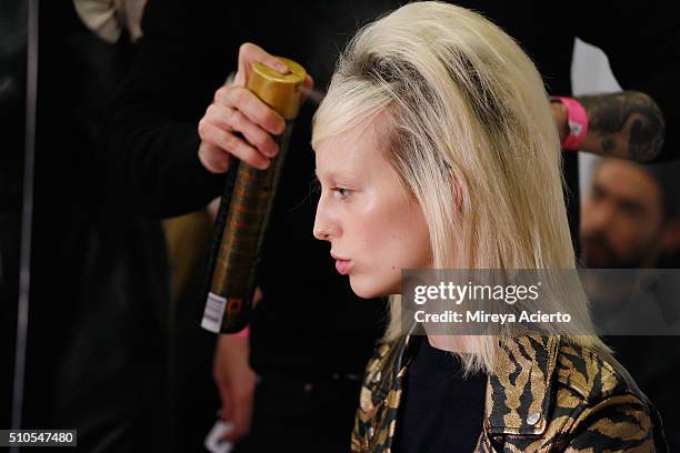 Model prepares backstage at the Maiyet backstage during Fall 2016 New York Fashion Week at Cedar Lake on February 15, 2016 in New York City.