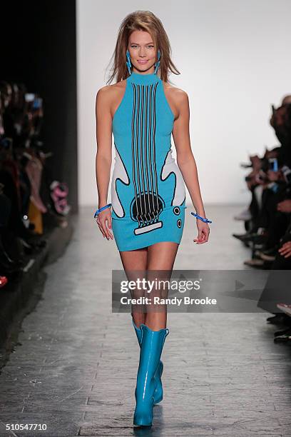 Model Karlie Kloss walks the runway wearing Jeremy Scott Fall 2016 during the Jeremy Scott fashion show at The Arc, Skylight at Moynihan Station on...