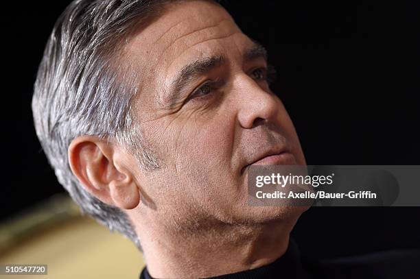 Actor George Clooney arrives at the premiere of Universal Pictures' 'Hail, Caesar!' at Regency Village Theatre on February 1, 2016 in Westwood,...