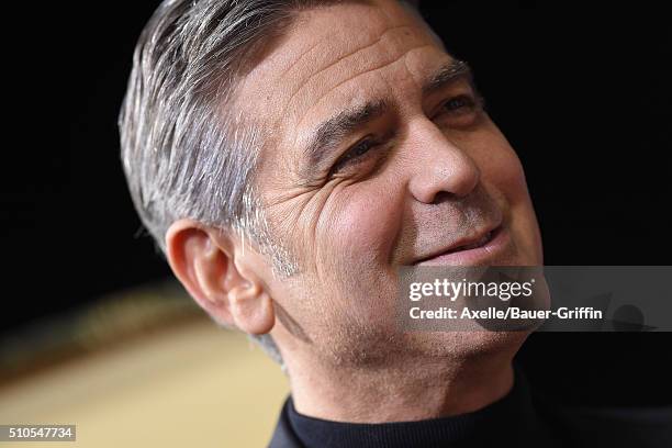 Actor George Clooney arrives at the premiere of Universal Pictures' 'Hail, Caesar!' at Regency Village Theatre on February 1, 2016 in Westwood,...