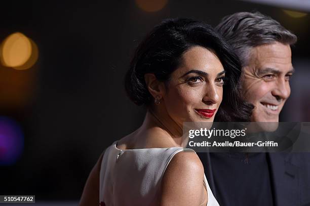 Amal Clooney and actor George Clooney arrive at the premiere of Universal Pictures' 'Hail, Caesar!' at Regency Village Theatre on February 1, 2016 in...