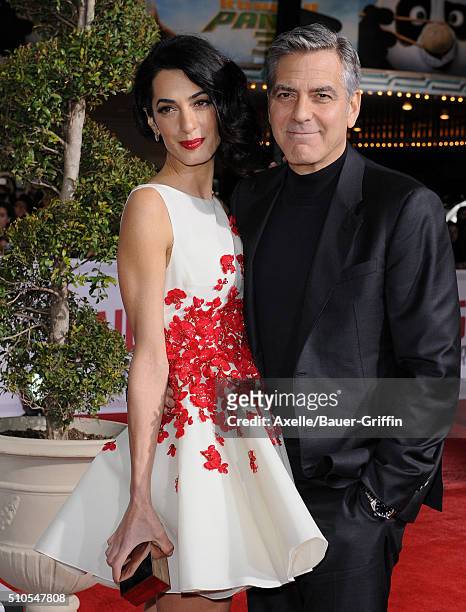 Amal Clooney and actor George Clooney arrive at the premiere of Universal Pictures' 'Hail, Caesar!' at Regency Village Theatre on February 1, 2016 in...