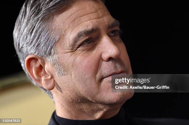 Actor George Clooney arrives at the premiere of Universal Pictures' 'Hail, Caesar!' at Regency Village Theatre on February 1, 2016 in Westwood,...