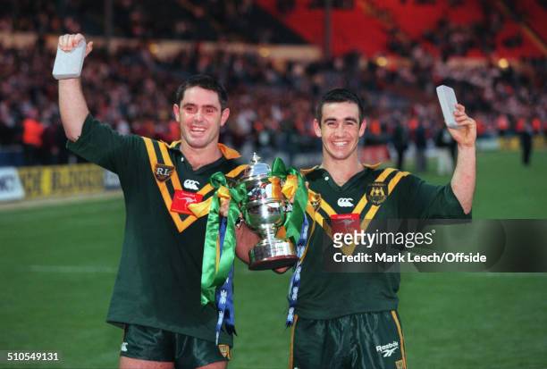 October 1995 Rugby League World Cup - Captain Brad Fittler and Andrew Johns of Australia hold the trophy.