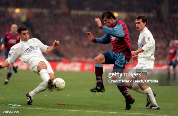 March 1996 - Coca Cola League Cup Final - Aston Villa v Leeds United - John Pemberton of Leeds tackles Savo Milosevic of Villa.