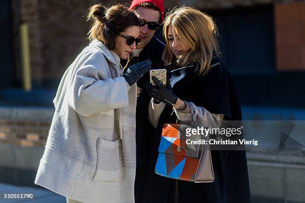 Spanish fashion blogger Gala Gonzalez is wearing a creme wool coat and grey gloves seen outside Derek Lam during New York Fashion Week: Women's...