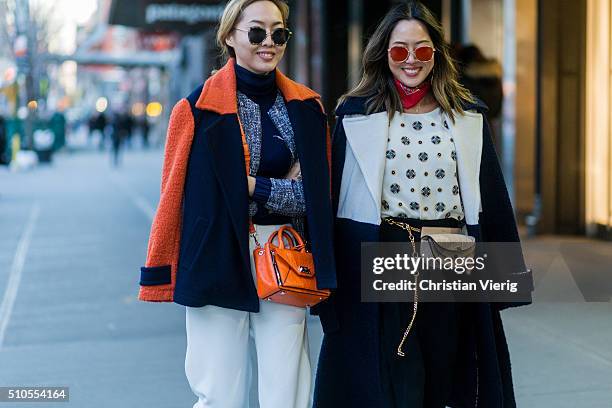 Dani Song and Aimee Song seen outside Diane von Furstenberg during New York Fashion Week: Women's Fall/Winter 2016 on February 14, 2016 in New York...