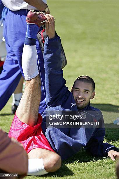 Paraguayan soccer player Ernesto Cristaldo stretches during a training session at Sachaca stadium in Arequipa, Peru, 13 July 2004. Paraguay will face...