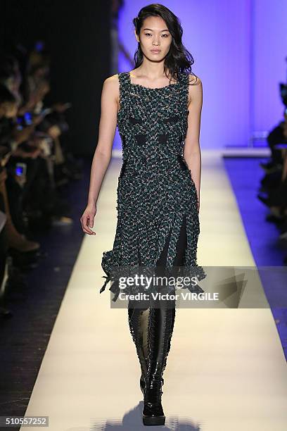 Model walks the runway at the Herve Leger By Max Azria Fall/Winter 2016 fashion show during New York Fashion Week on February 13, 2016 in New York...