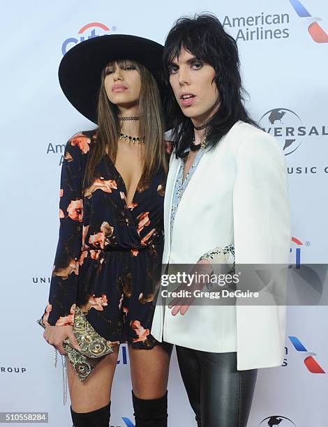 Singer Luke Spiller of The Struts and Laura Cartier arrive at Universal Music Group's 2016 GRAMMY After Party at The Theatre At The Ace Hotel on...