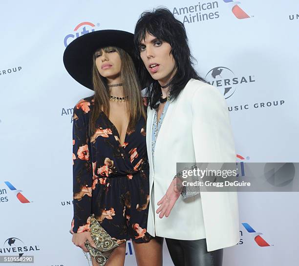 Singer Luke Spiller of The Struts and Laura Cartier arrive at Universal Music Group's 2016 GRAMMY After Party at The Theatre At The Ace Hotel on...