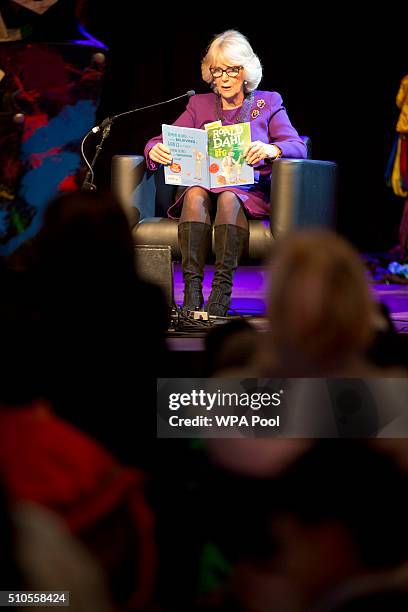 Camilla, Duchess of Cornwall reads during a preview of the new 'Wondercrump World of Roald Dahl' exhibition which celebrates the author's Centenary...