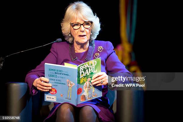 Camilla, Duchess of Cornwall reads during a preview of the new 'Wondercrump World of Roald Dahl' exhibition which celebrates the author's Centenary...